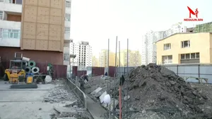 100 АЙЛД БАРИЛГЫН СУУРЬ ЛУУ ХАЛДАЖ БАРИЛГА БАРИХААР ЗЭХЭЖ БАЙСАН ЭТГЭЭД ТУС ҮЙЛДЛЭЭ ТАСЛАН   ЗОГСООЖЭЭ
